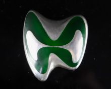 A late 1960's Danish Georg Jensen silver and green enamel abstract brooch, designed by Henning