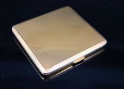 A George V engine turned 9ct gold cigarette case, with interior inscription, 83mm, gross 106.6