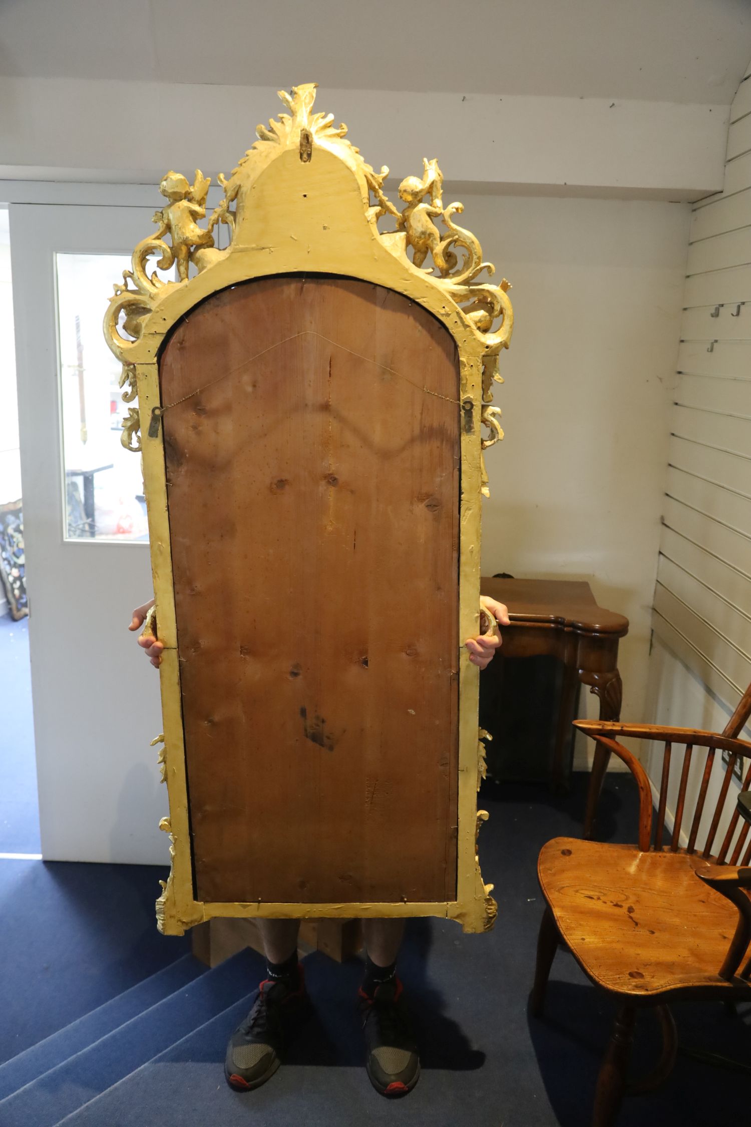 A pair of 19th century French carved giltwood wall mirrors, with scallop and scroll crests flanked - Image 2 of 5