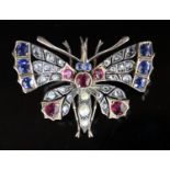 A Victorian, gold and silver, ruby, sapphire, split pearl and rose cut diamond set butterfly pendant