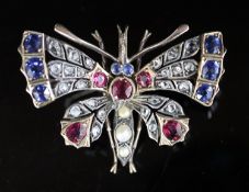 A Victorian, gold and silver, ruby, sapphire, split pearl and rose cut diamond set butterfly pendant