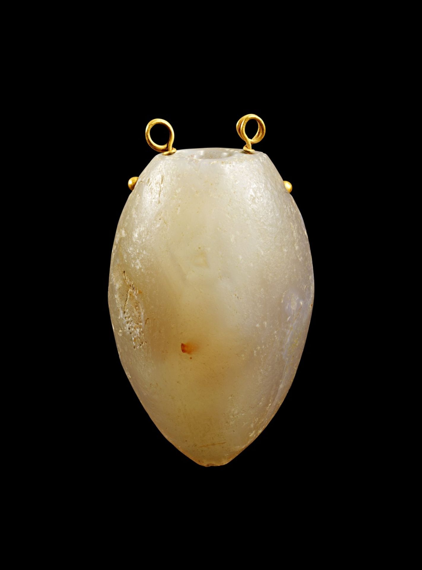 Herz-Amulettanhänger. Phönizisch, 5. - 3. Jh. v. Chr. L ca. 6,5cm. Herzförmiger Stein aus Achat