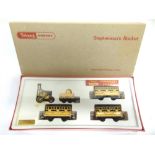 [OO GAUGE]. A TRI-ANG HORBY NO.R346C, STEPHENSON'S ROCKET TRAIN comprising a locomotive and three