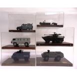 SIX HAND-BUILT RESIN EXHIBITION MODELS OF ARMOURED ANTI-RIOT, SECURITY & COMBAT VEHICLES