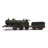 [O GAUGE]. A G.N.R. 4-4-2 TENDER LOCOMOTIVE probably by Bing, hand-painted lined green livery,