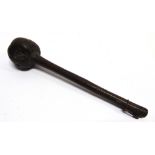 A 19TH CENTURY HARDWOOD KNOBKERRIE probably Zulu, with a chip carved grip, 41cm long.