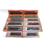 [OO GAUGE]. TWELVE ASSORTED COACHES & VANS by Tri-ang Hornby (4); and Lima (8), various liveries (