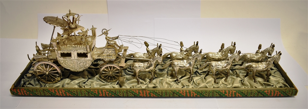 A FAR EASTERN WHITE METAL CARRIAGE PULLED BY EIGHT HORSES WITH ATTENDANTS the embossed carriage - Image 2 of 3