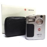 A LEICA DIGILUX ZOOM CAMERA with a 1:32 - 5.0 / 6.6 - 19.8mm lens, in limp leather travel case and
