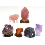 A GROUP OF HARDSTONE CARVINGS the largest a rose quartz Buddha on stand, 11.5cm high overall (6)