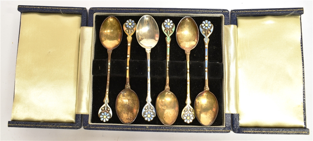 A CASED SET OF SIX SILVER AND ENAMEL COFFEE SPOONS The cloisonné enamel flower head, finials and