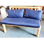 A CONTEMPORARY BAMBOO FRAMED TWO SEATER SOFA 125cm wide