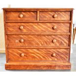 AN EDWARDIAN CHEST OF TWO SHORT AND THREE LONG DRAWERS on plinth base, 117cm wide 54cm deep 108cm