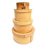 A SET OF THREE GRADUATED CIRCULAR LIDDED BOXES 37cm, 31cm and 26cm diamter; and an Edwardian leather