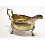 A GEORGIAN SILVER SAUCE BOAT by Walter Brind, London marks for 1770, of traditional form with