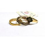 A GROUP OF THREE RINGS INCLUDING A VINTAGE 9CT GOLD EMERALD AND DIAMOND CLUSTER RING centred with