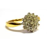 A DIAMOND ROUND CLUSTER 18CT YELLOW GOLD RING nineteen small round brilliant cut diamonds with a