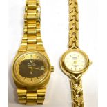 BULOVA, ACUTRON, A LADY'S GOLD-PLATED AND STAINLESS STEEL TONNEAU-SHAPED BRACELET WATCH, CIRCA