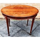 AN EDWARDIAN FIGURED MAHOGANY OCCASIONAL TABLE the oval top 92cm x 65cm, on square tapering