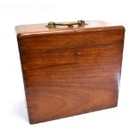 A MAHOGANY BOX OF DOVETAILED CONSTRUCTION with brass carrying handle, 31cm wide 17cm deep 28cm high