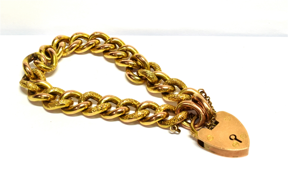 AN EARLY 20TH CENTURY 9CT GOLD CURB LINK BRACELET With padlock fastener, the hollow patented curb - Image 2 of 2