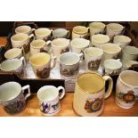 FOUR GREAT WAR PEACE MUGS together with twenty-one royal commemorative mugs and beakers, including