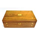 A VICTORIAN BRASS BOUND MAHOGANY WRITING SLOPE with side drawers and flush fitting brass handles,