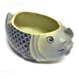 A CHINESE CERAMIC PLANTER modelled as two fish, printed seal type mark to base, 39cm wide