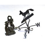A CAST DOOR STOP centred with a fox mark, 29cm high, and a weather vane with running fox silhouette,