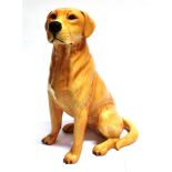 A BESWICK FIRESIDE FIGURE OF A SEATED YELLOW LABRADOR no. 2314, height 35cm