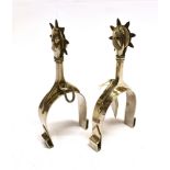 A PAIR OF STEEL SPURS with hound head decoration, 17cm long