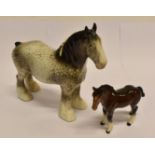 A BESWICK FIGURE OF A DAPPLE-GREY HEAVY HORSE and her foal, horse 22cm high