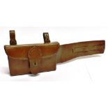 A LEATHER SANDWICH CASE HOLDER for saddle mounting, width 15cm