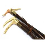 FOUR ASSORTED HUNTING CROPS (three by Swaine), with antler grips and plaited leather shafts and