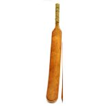 CRICKET - A LATE 18TH CENTURY SHAPED CRICKET BAT hand crafted in heavy willow, formed in one piece