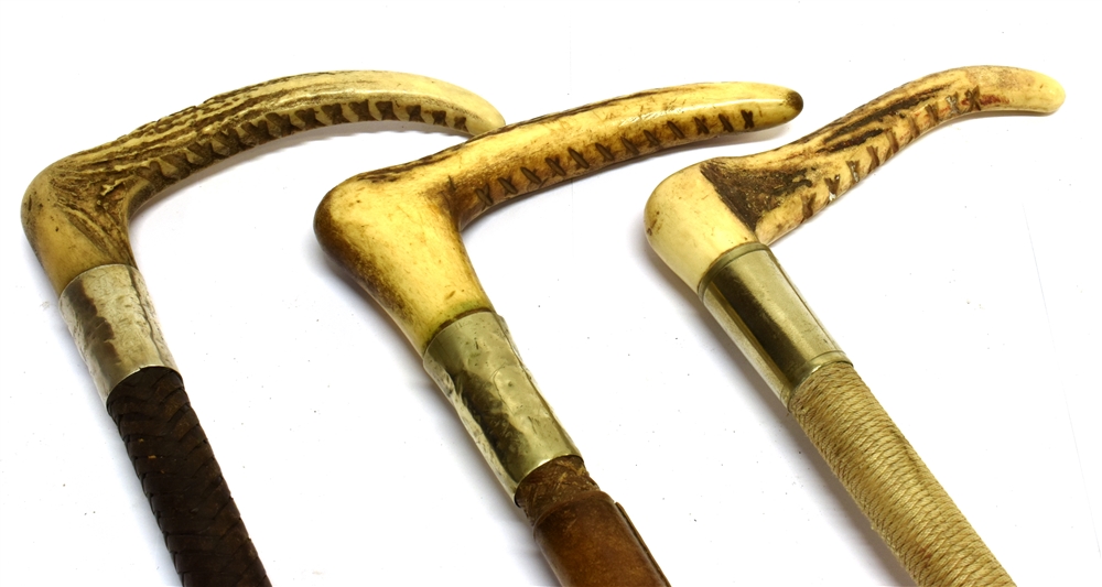 THREE GENT'S HUNTING WHIPS, one by Swaine, all with antler grips; one with leather shaft and two - Image 2 of 2