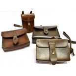 FOUR LEATHER SANDWICH CASE HOLDERS for saddle mounting, the largest 15cm wide