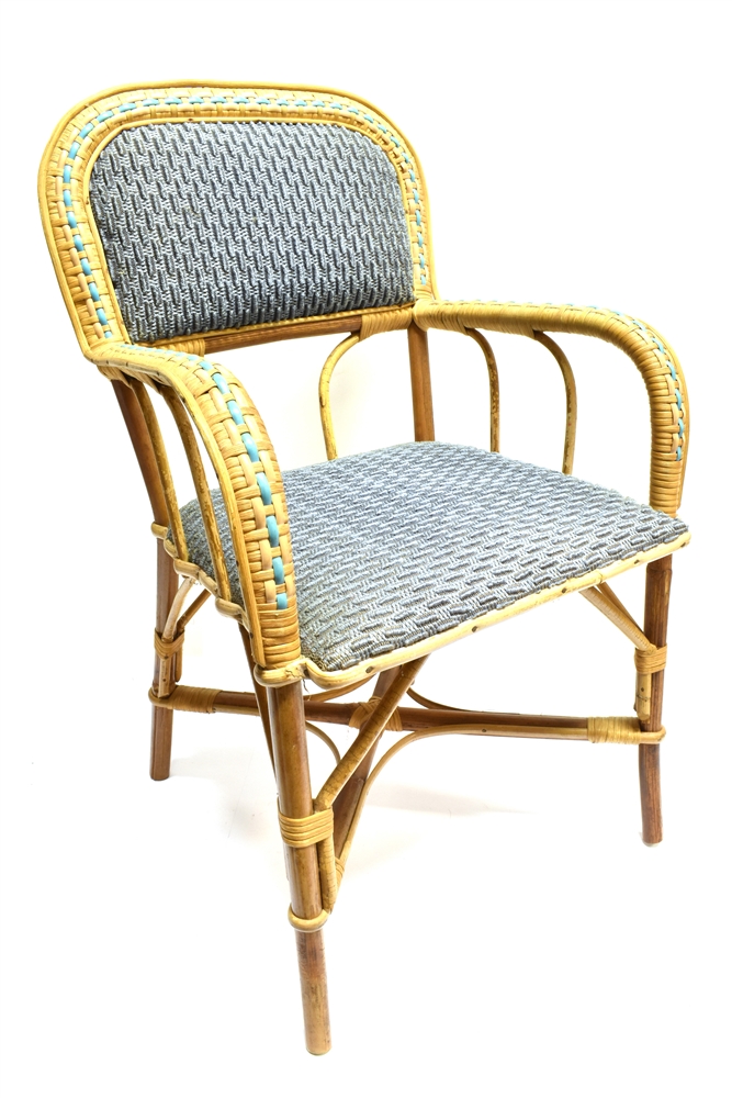 A CHILD'S CANED CHAIR with an upholstered seat and back, 61cm high.
