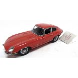 A 1/24 SCALE FRANKLIN MINT 1961 JAGUAR E-TYPE COUPE red, near mint, complete with swing tag and