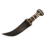 A MIDDLE EASTERN DAGGER with a 15cm curved steel blade and a wood and bone handle, overall 26.5cm