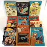 [BOOKS]. CHILDRENS Assorted annuals, comprising The Monkees, circa 1968; Daktari, circa 1967; Scooby
