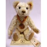 A STEIFF COLLECTOR'S TEDDY BEAR 'THE MILLENNIUM BEAR' (EAN 654701), cream, limited edition No.