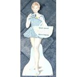 A KODAK FLOOR-STANDING SHOWCARD in the form of a young lady wearing a striped beach dress, 'Get your