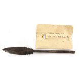 A METAL SPEAR HEAD with an accompanying typed label 'Arabian Spear, 1916 / Cap. Ian Baillie R.A.F.',