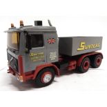 A WHITE METAL MODEL OF A VOLVO HEAVY HAULAGE TRACTOR 'SUNTERS' generally good condition (ballast box