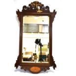 A PARCEL GILT MAHOGANY PIER MIRROR with gilt Ho Ho bird crest and parquetry inland oval motif to