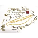 A QUANTITY OF SILVER AND WHITE METAL COSTUME JEWELLERY the silver jewellery to include an Egyptian