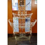 A LARGE THREE TIER WIREWORK PLANTER 94cm wide 127cm high