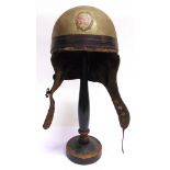 A CROMWELL MOTORCYCLE HELMET complete with liner, leather sweatband and leather chin-strap, the