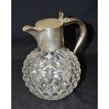 A SILVER TOPPED SMALL GLASS CLARET JUG The plain silver mounts with flat lid, hallmarks for London